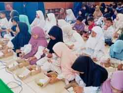 Polres Nganjuk Bagikan 100 Paket Makanan Bergizi Gratis di SDN 1 Sukomoro