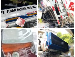 Diduga Kelebihan muatan Tangki Biru Putih milik PT. Sinar Almas Mulia terjun bebas kedalam sungai